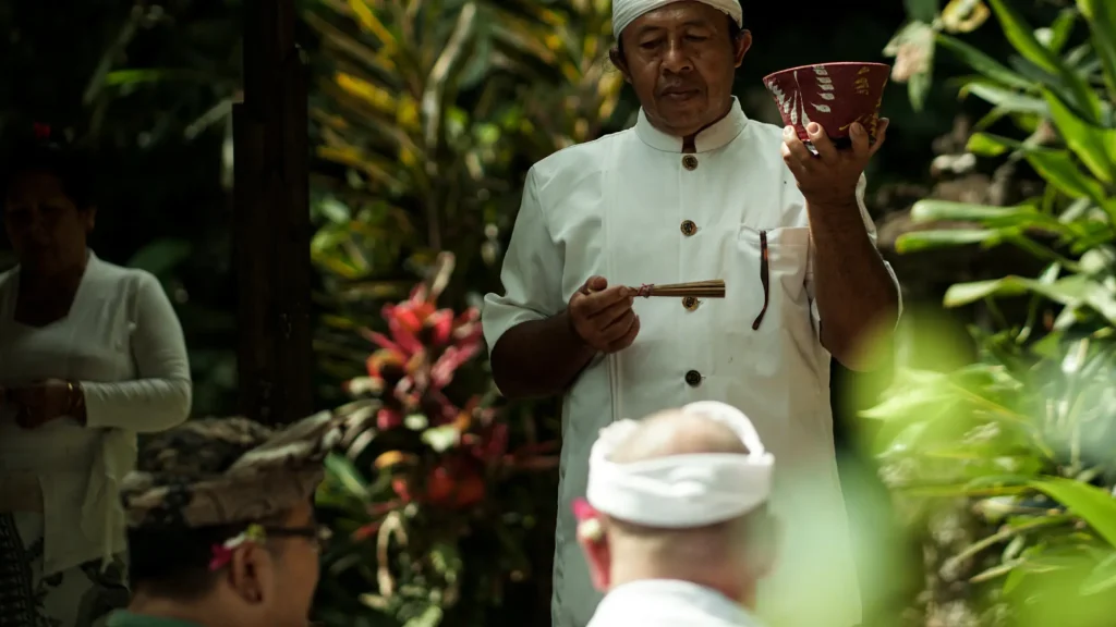 blessing and purification with balinese mangku