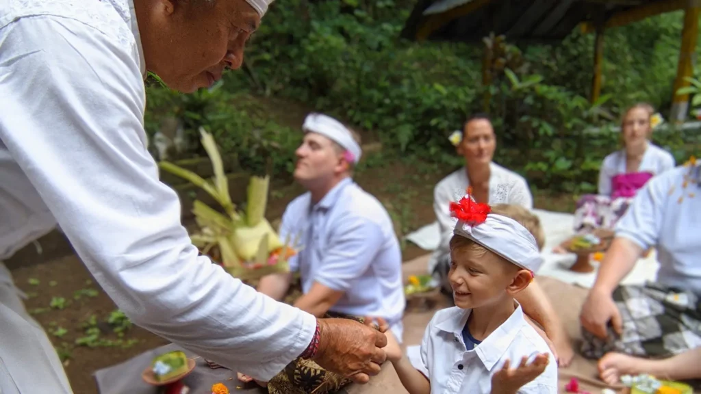 family on bali ceremony